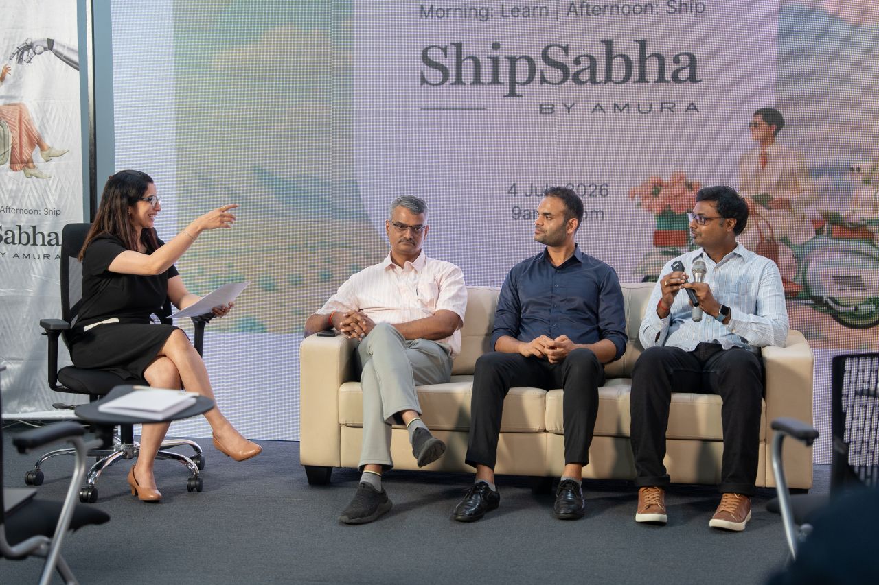 Panel discussion at Ship Sabha with Arjun Thakur and fellow speakers, moderated on stage